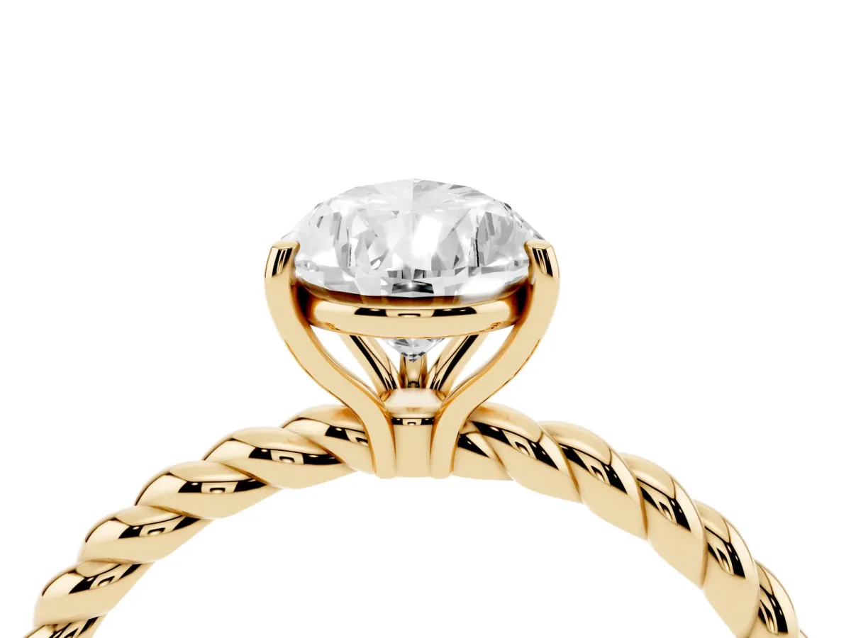 Pear Cut Solitaire Twist Band Ring with Four-Prong Setting Yellow gold
