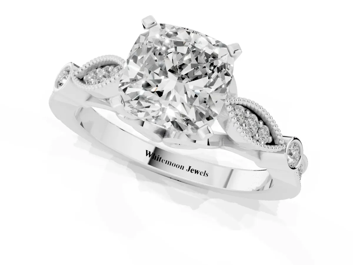 Cushion Cut Cut Diamond with Milgrain Marquise and Bezel Accents on a Solitaire Band with Prong Setting Platinum