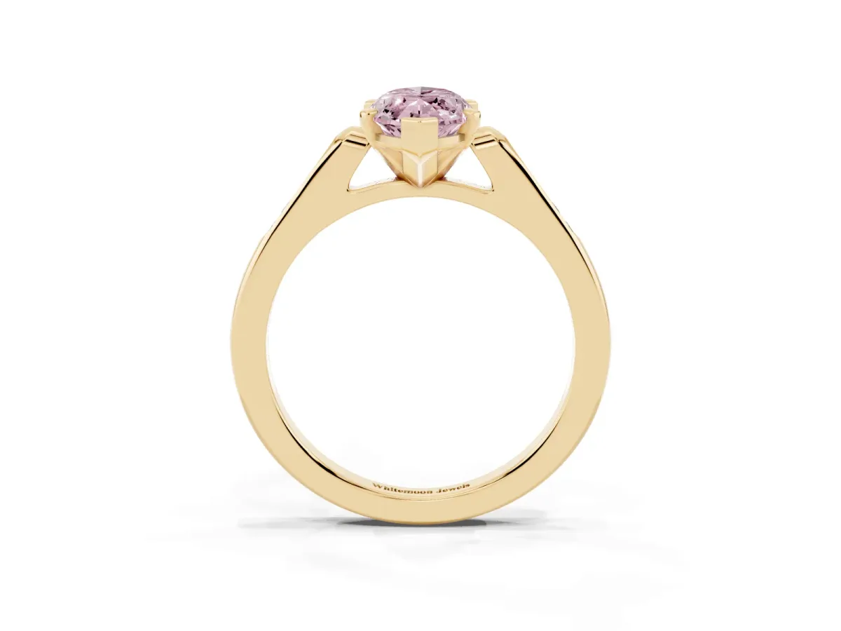 Fancy Pink Marquise Cut Diamond Solitaire Ring with Channel Set Round Band and Prong Setting Yellow gold
