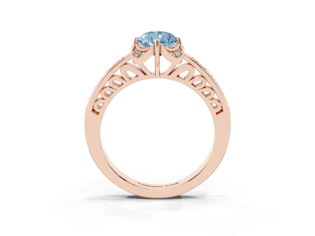 Fancy Blue Pear Cut Cut Halo Diamond Ring with Channel Set Band and Four-Prong Setting Rose gold
