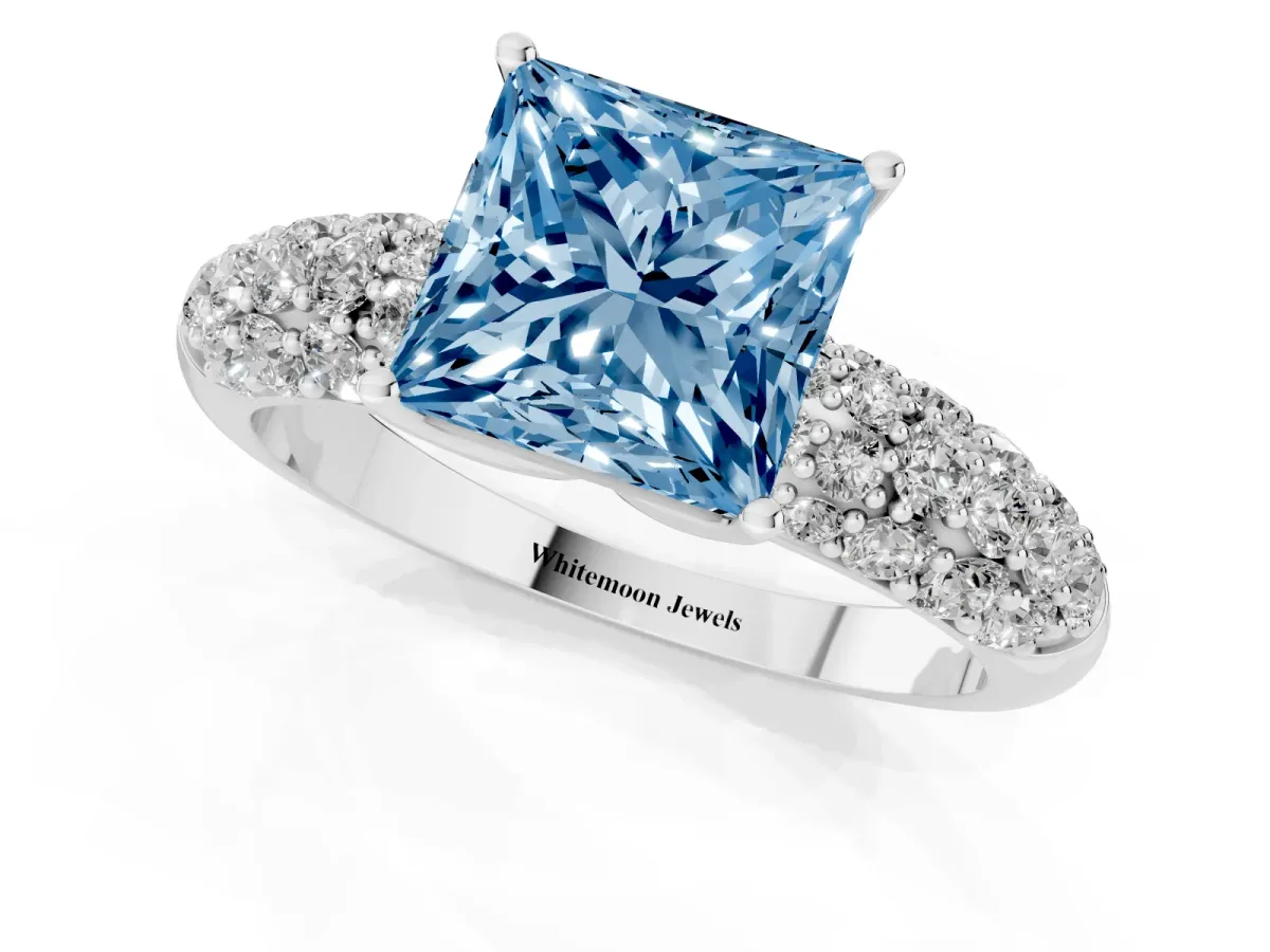 Fancy Blue Princess Cut Diamond Pavé Band Solitaire Ring with Four-Prong Setting Silver