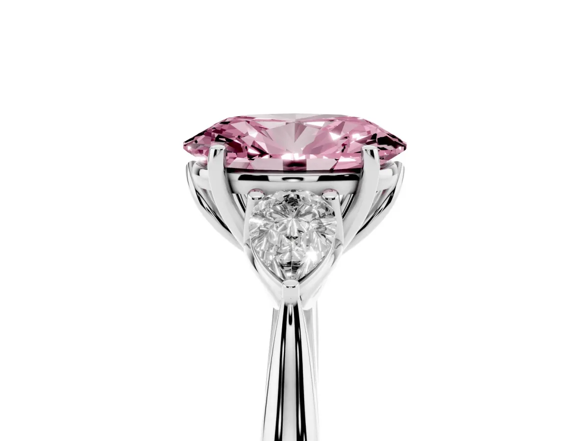 Fancy Pink Three-Stone Oval Cut Diamond Ring with Pear Side Stones in Four-Prong Setting Platinum