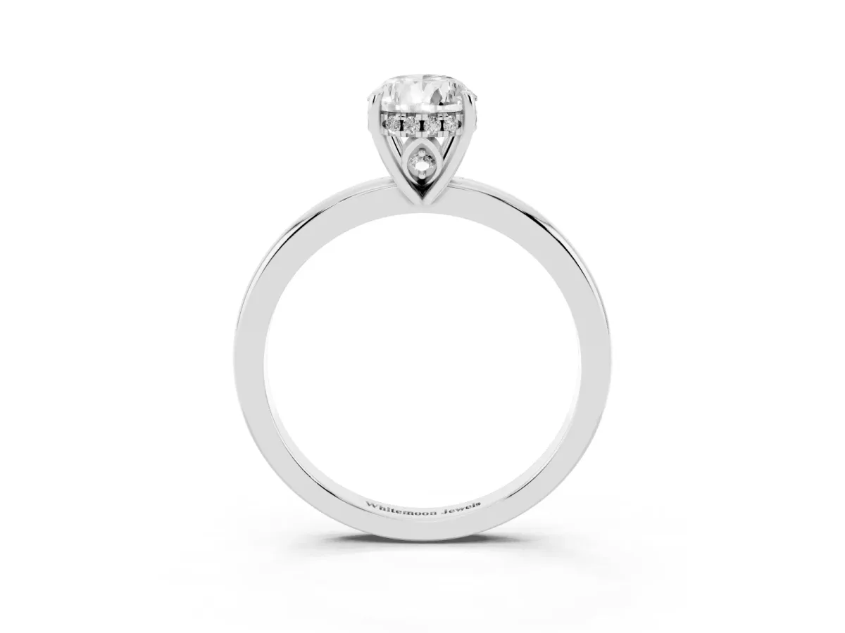 Pear Cut Solitaire Diamond Ring with Prong Setting and Plain Band Platinum