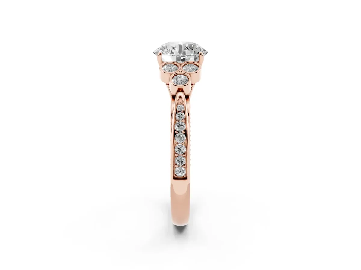 Round Cut Cut Diamond Engagement Ring with Bezel Set Round Side Stones and Prong Setting Rose gold