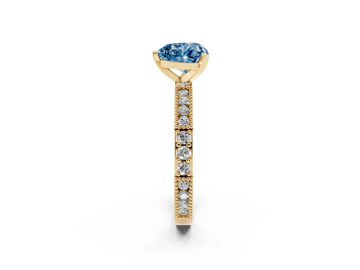 Fancy Blue Heart Cut Solitaire with Pavé Band and Four-Prong Setting Yellow gold