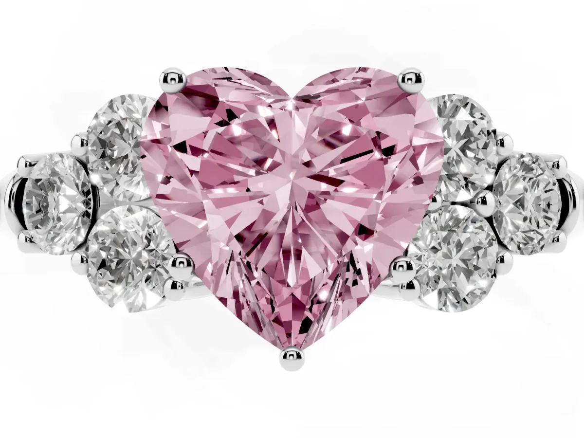Fancy Pink Heart Cut Cut Diamond Cluster Ring with Round Accent Stones and Prong Setting on a Classic Band White gold