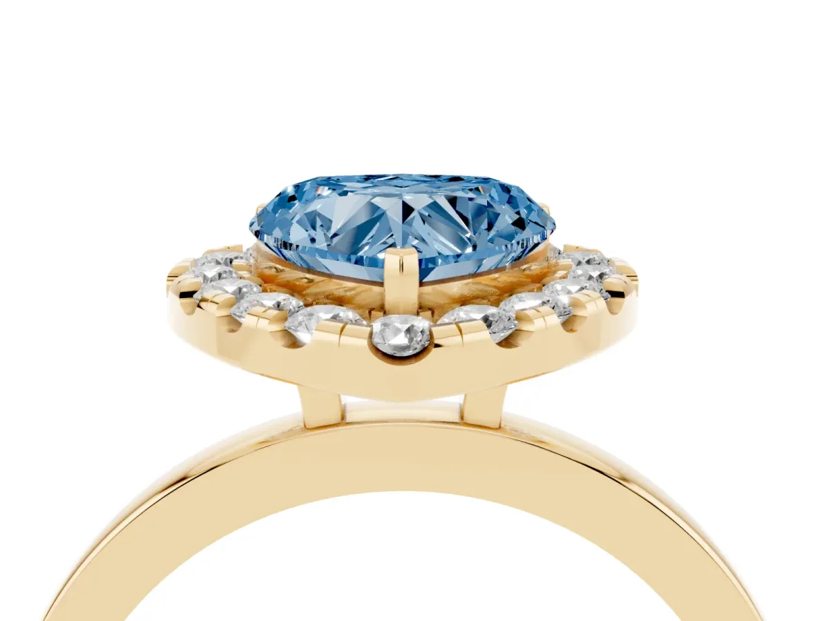 Fancy Blue Heart Cut Halo Diamond Solitaire with Pavé Band and Four-Prong Setting Yellow gold