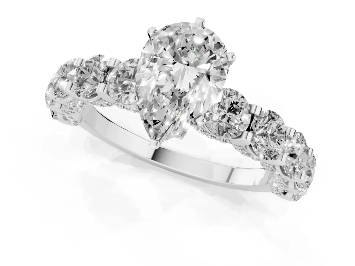Pear Cut Diamond Side Stone Engagement Ring with Four-Prong Setting Silver