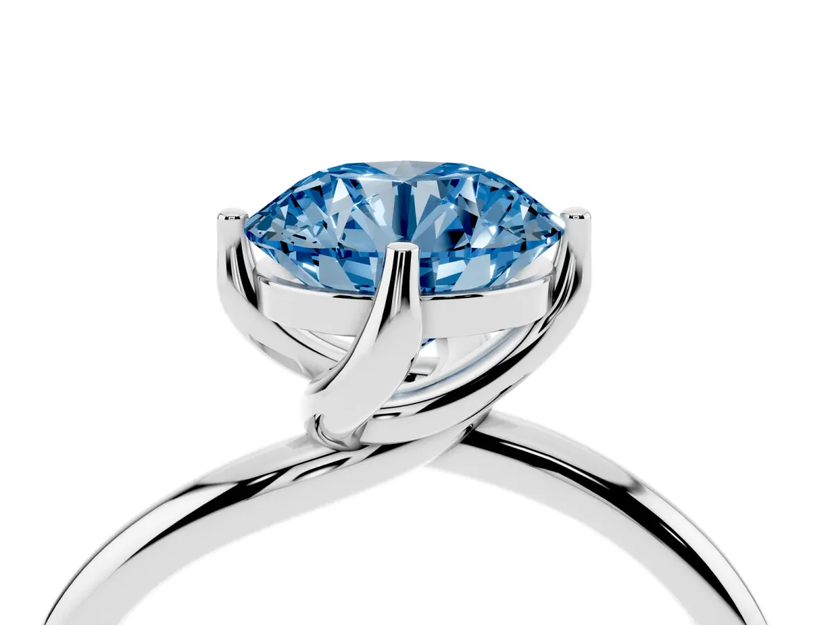 Fancy Blue Round Cut Diamond Solitaire Engagement Ring with Four-Prong Setting and Classic Band Silver