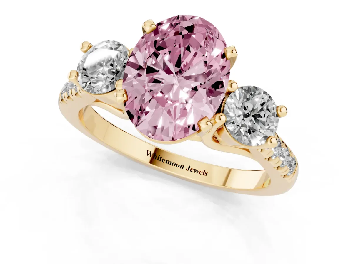 Fancy Pink Three-Stone Oval Cut Diamond Pavé Band with Four-Prong Setting Yellow gold