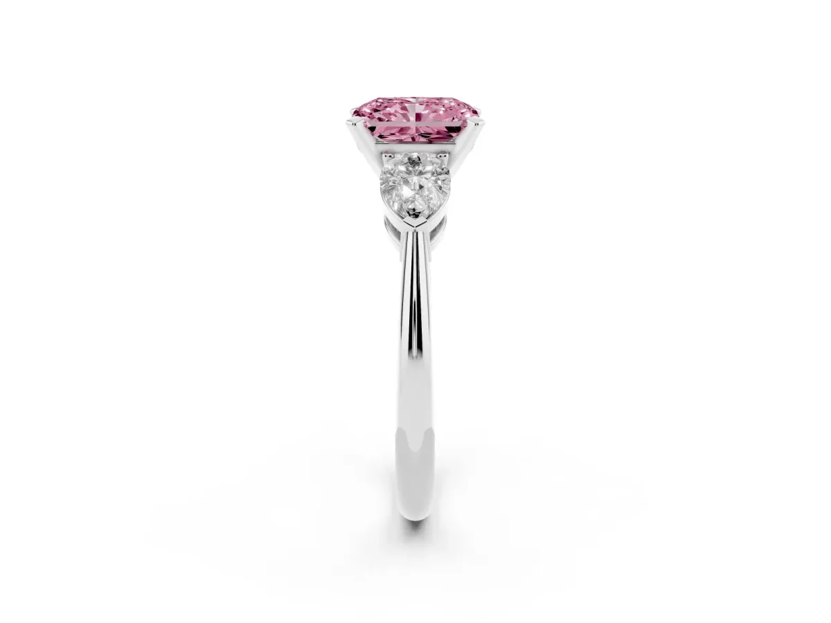 Fancy Pink Three-Stone Radiant Cut Diamond Ring with Pear Side Stones and Four-Prong Setting Silver