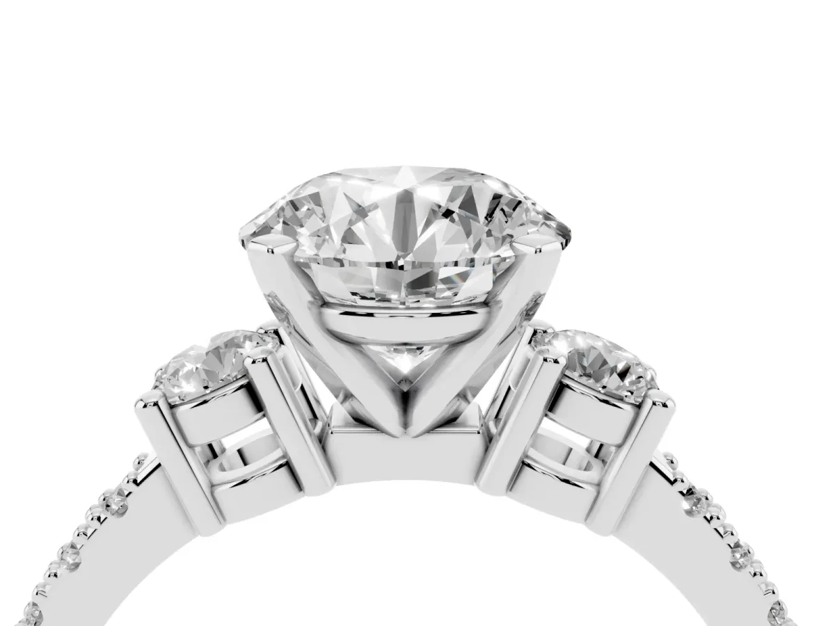 Round Cut Three-Stone Diamond Pavé Band with Prong Setting White gold