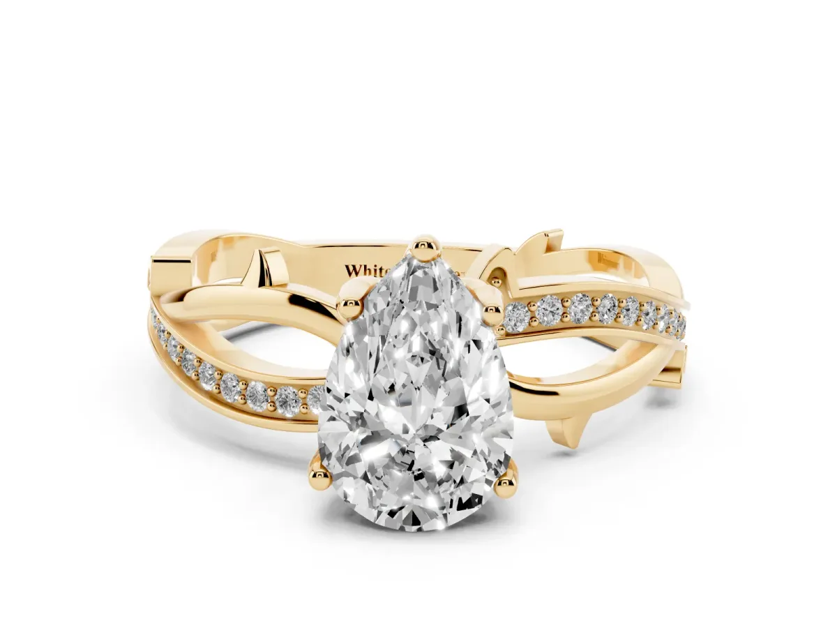 Pear Cut Solitaire Twist Band with Pavé Accents and Four-Prong Setting Yellow gold