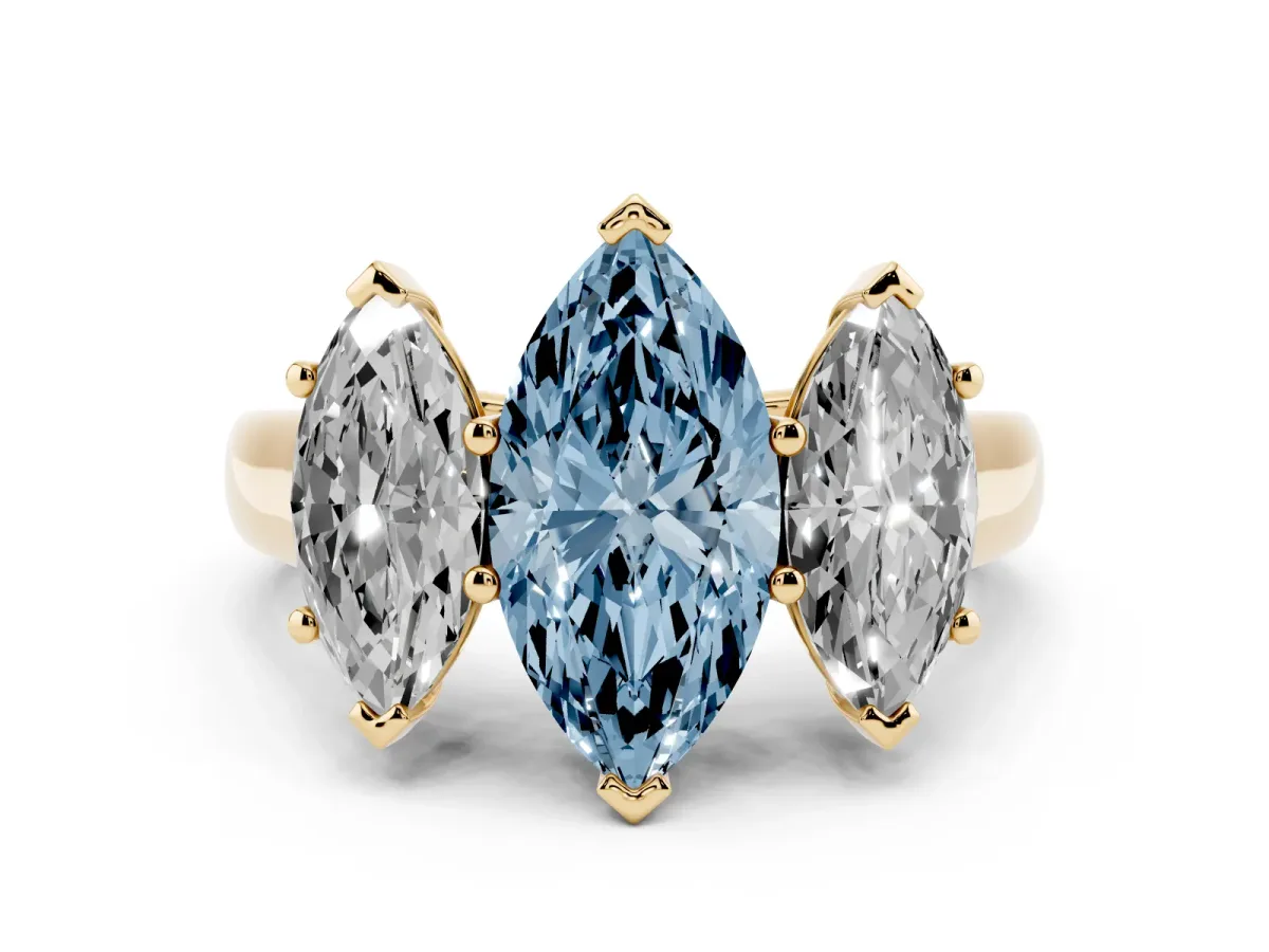 Fancy Blue Marquise Cut Three-Stone Diamond Ring with Prong Setting on a Classic Band Yellow gold