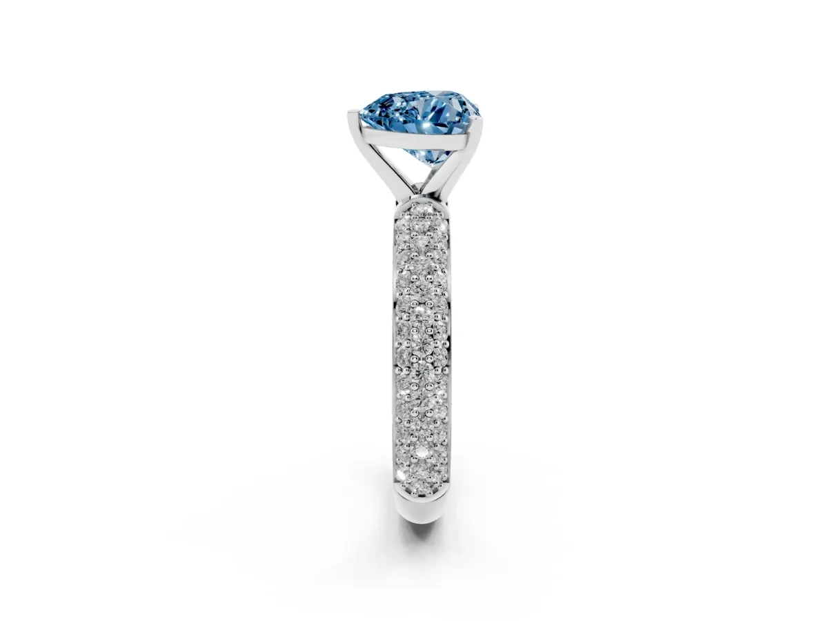 Fancy Blue Heart Cut Diamond Solitaire Ring with Prong Setting and Pavé Band Silver