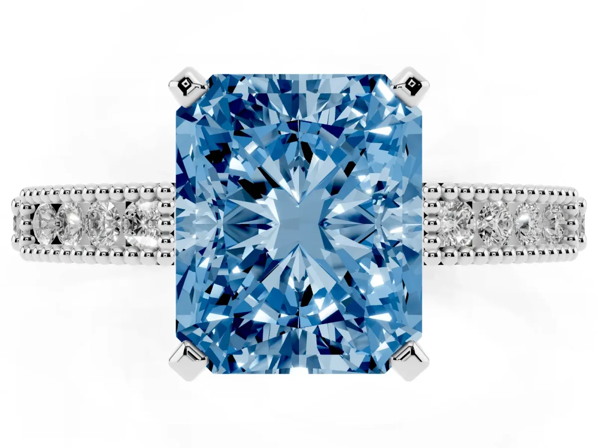 Fancy Blue Radiant Cut Solitaire with Pavé Band and Four-Prong Setting Silver