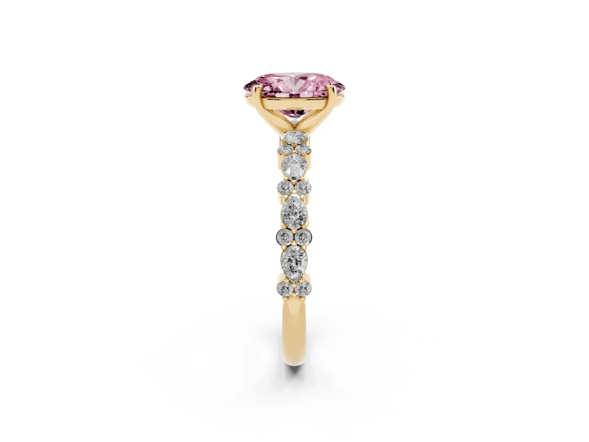 Fancy Pink Oval Cut Diamond Side Stone Solitaire Ring with Round and Four-Prong Setting Yellow gold