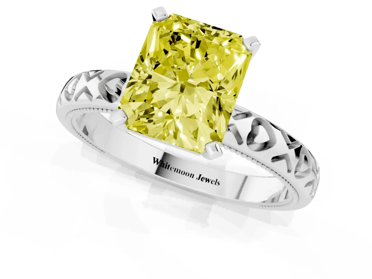 Fancy Yellow Radiant Cut Solitaire Diamond Engagement Ring with XO Engraved Band and Four-Prong Setting Silver