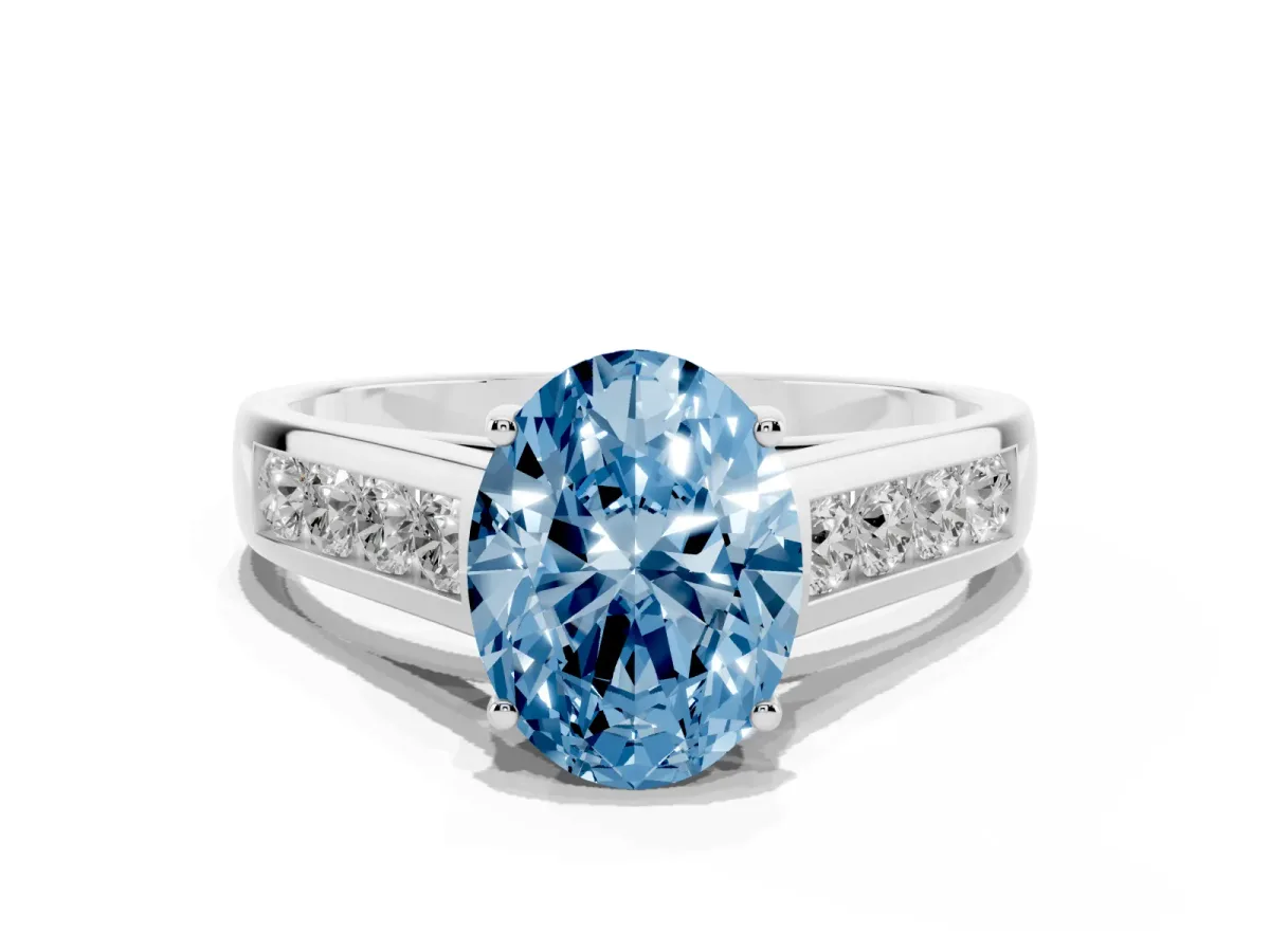 Fancy Blue Oval Cut Brilliant Channel-Set Solitaire Ring with Four-Prong Setting Silver