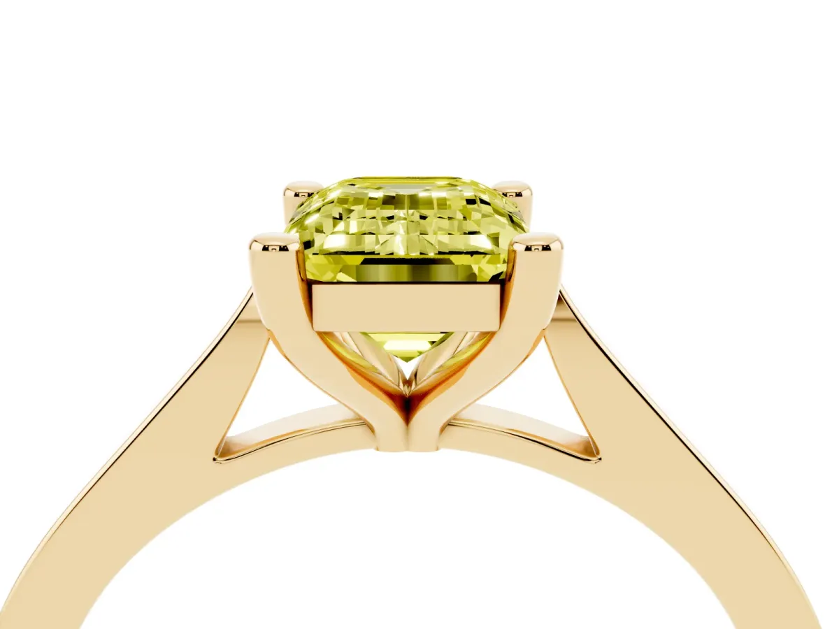 Fancy Yellow Emerald Cut Solitaire Diamond Ring with Four-Prong Setting and Tapered Band Yellow gold