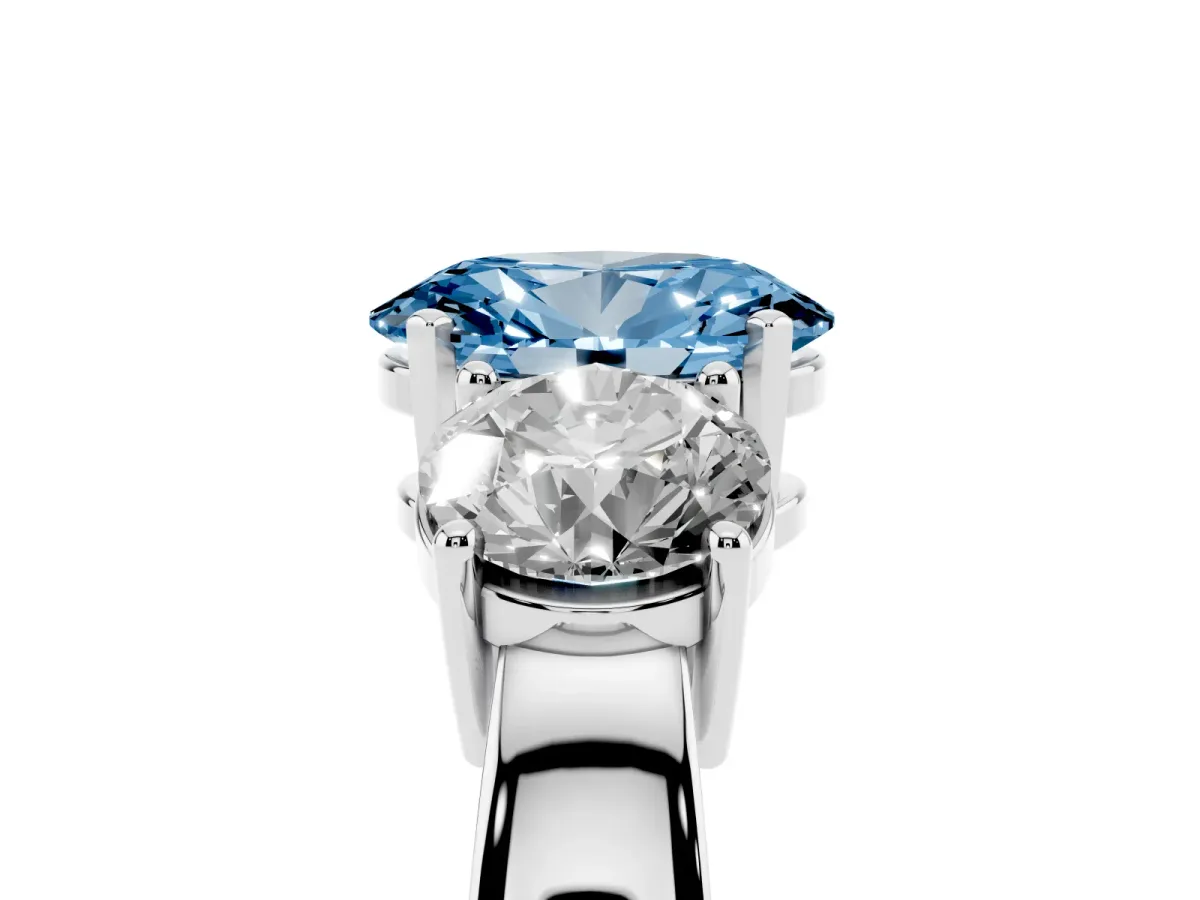 Fancy Blue Three-Stone Oval Cut Diamond Ring with Round Side Stones, Classic Band, and Four-Prong Setting White gold