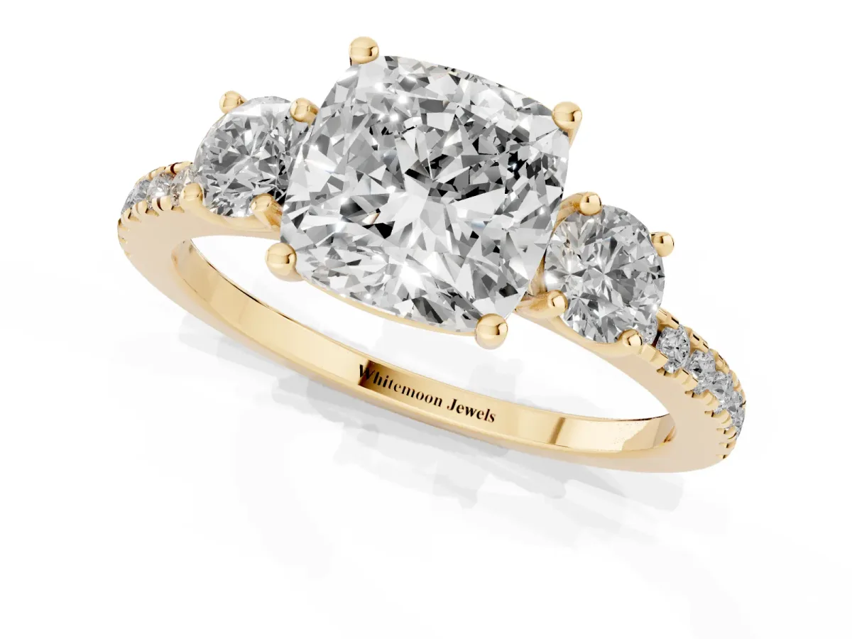 Three-Stone Cushion Cut Cut Diamond Pavé Band with Prong Setting Yellow gold
