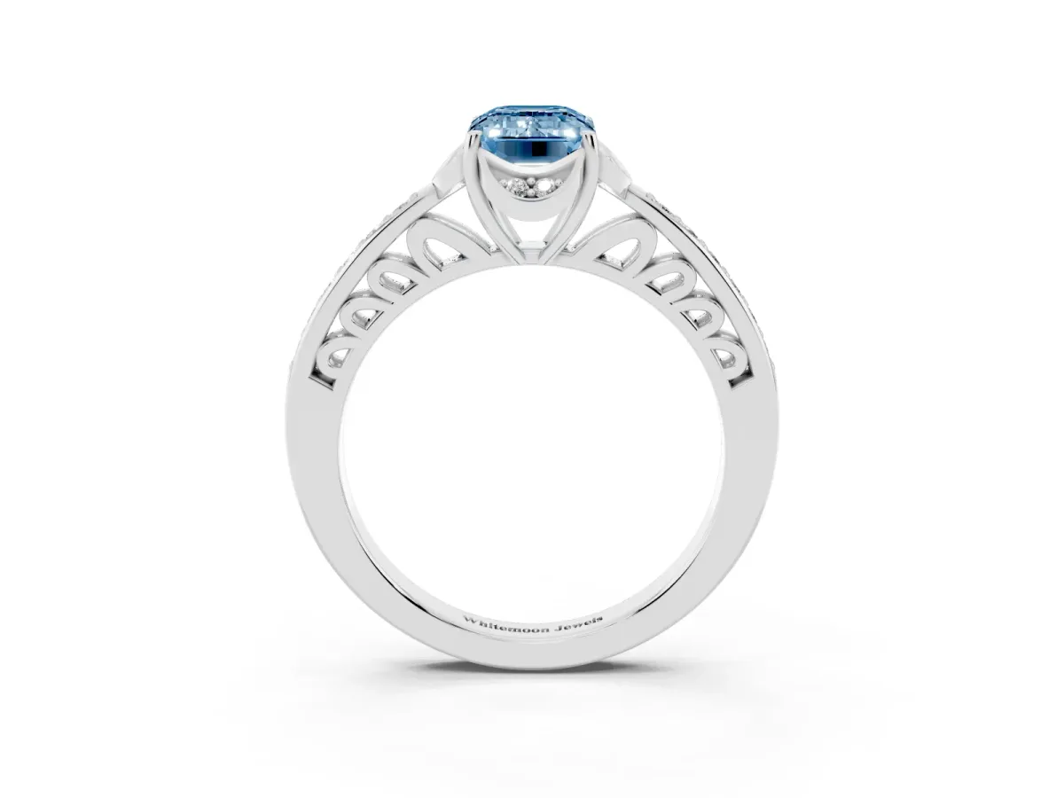 Fancy Blue Emerald Cut Cut Halo Diamond Ring with Channel Set Band and Four-Prong Setting Silver