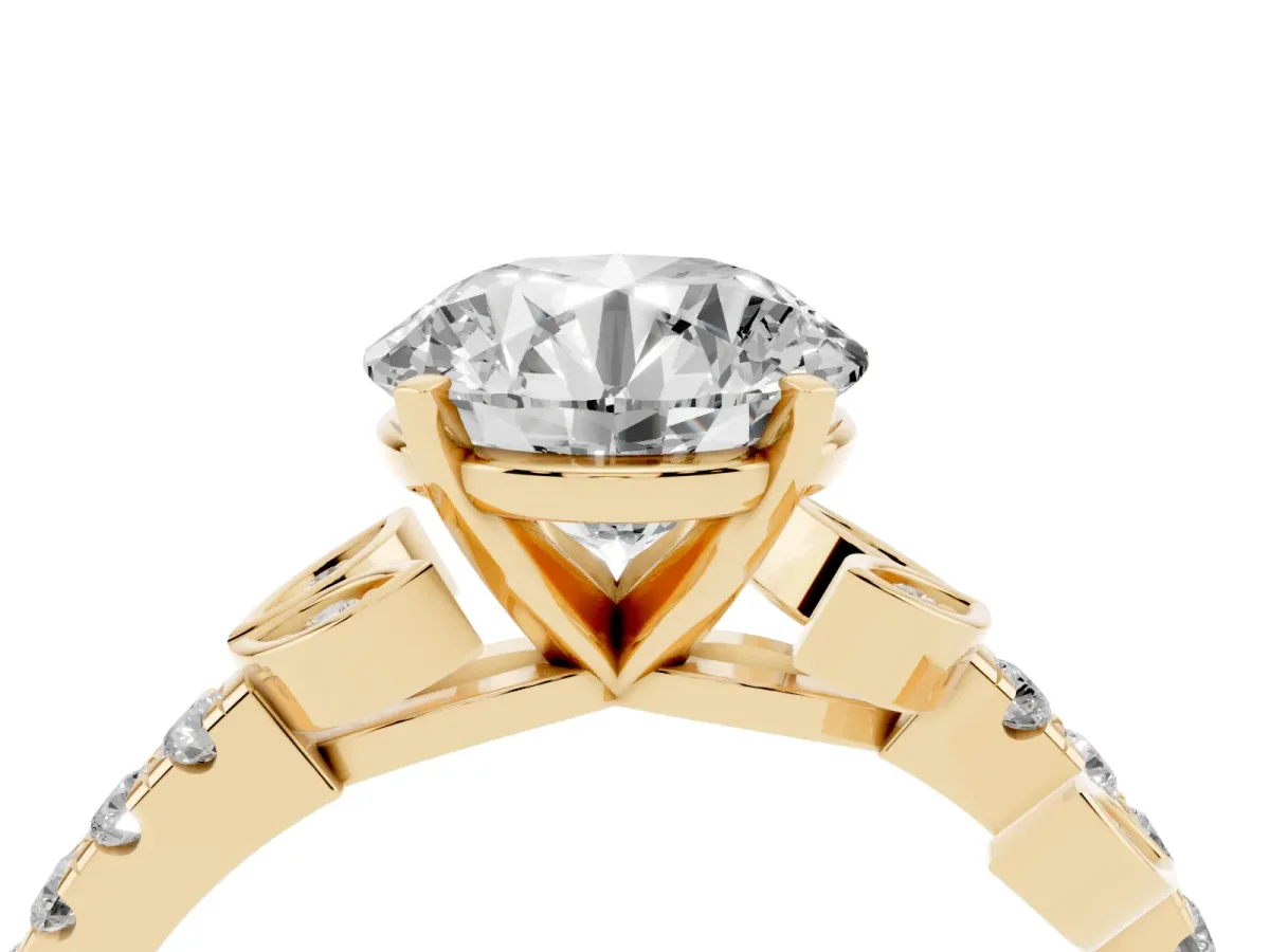 Round Cut Solitaire Leaf-Inspired Diamond Ring with Pavé Band and Four-Prong Setting Yellow gold