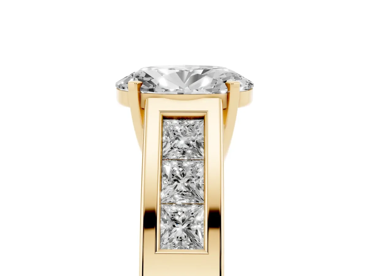 Oval Cut Cut Channel Set Solitaire Ring with Four-Prong Setting Yellow gold