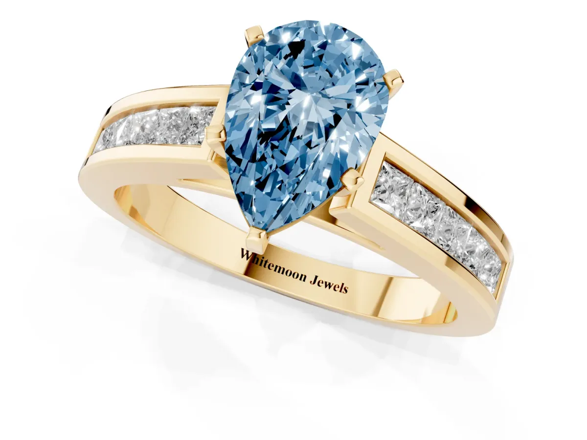 Fancy Blue Pear Cut Solitaire Diamond Ring with Channel-Set Band and Four-Prong Setting Yellow gold