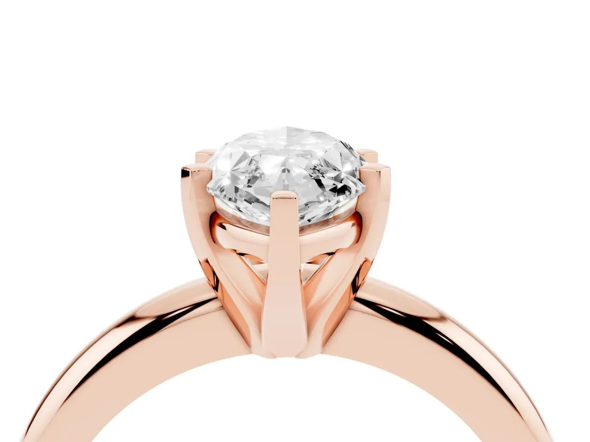Marquise Cut Diamond Solitaire Engagement Ring with Round Band and Four-Prong Setting Rose gold