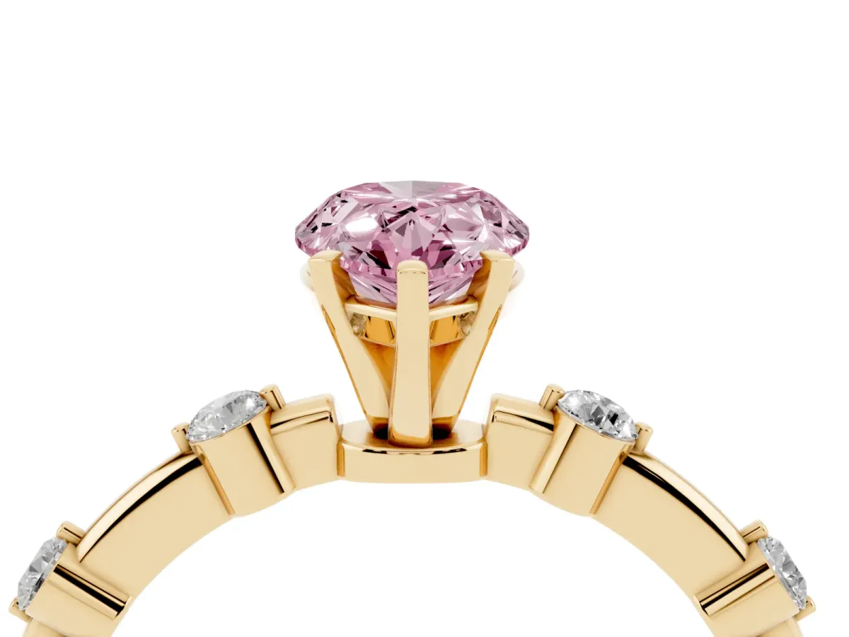 Fancy Pink Pear Cut Solitaire Diamond Ring with Bezel Set Side Stones and Prong Setting Yellow gold