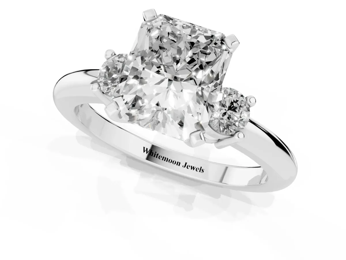 Three-Stone Radiant Cut Cut Diamond Solitaire with Prong Setting and Classic Band Silver