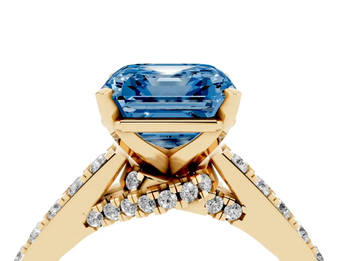 Fancy Blue Asscher Cut Diamond Solitaire Ring with Crossover Gallery and Round Pavé Band Yellow gold