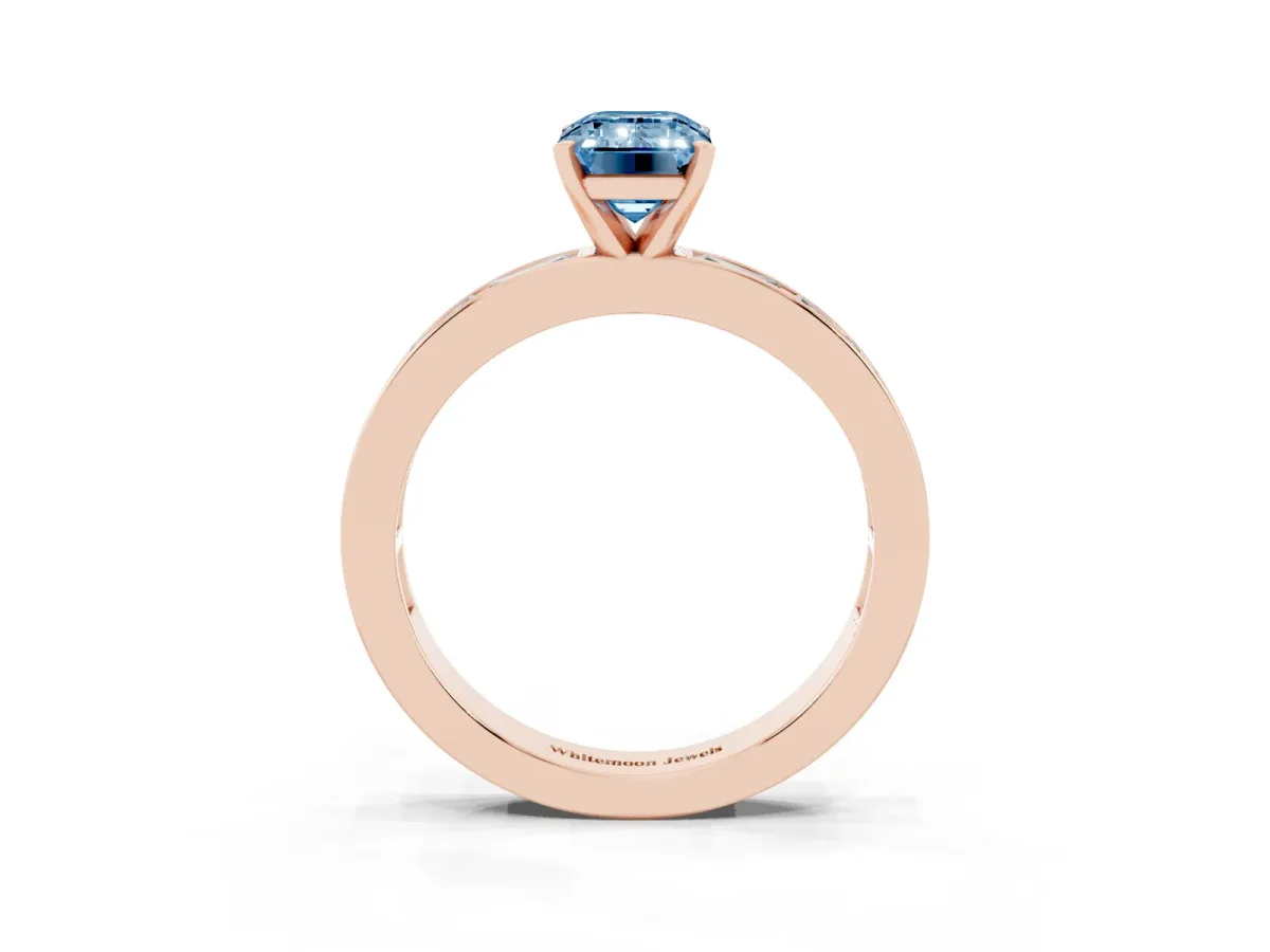 Fancy Blue Emerald Cut Solitaire Diamond Ring with Channel-Set Baguette Band and Four-Prong Setting Rose gold