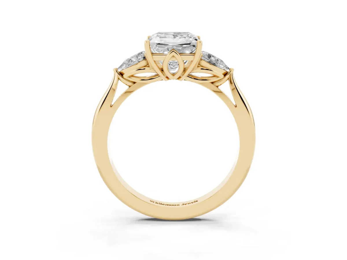 Princess Cut Diamond Three-Stone Ring with Pear Side Stones and Prong Setting Yellow gold