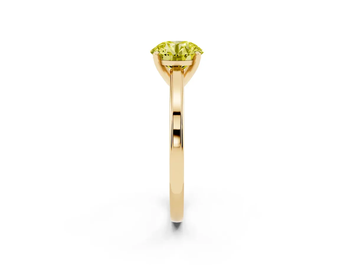 Fancy Yellow Round Cut Solitaire Diamond Ring with Four-Prong Setting and Classic Band Yellow gold