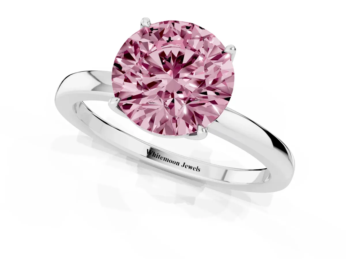 Fancy Pink Round Cut Diamond Solitaire Ring with Thin Band and Prong Setting Platinum