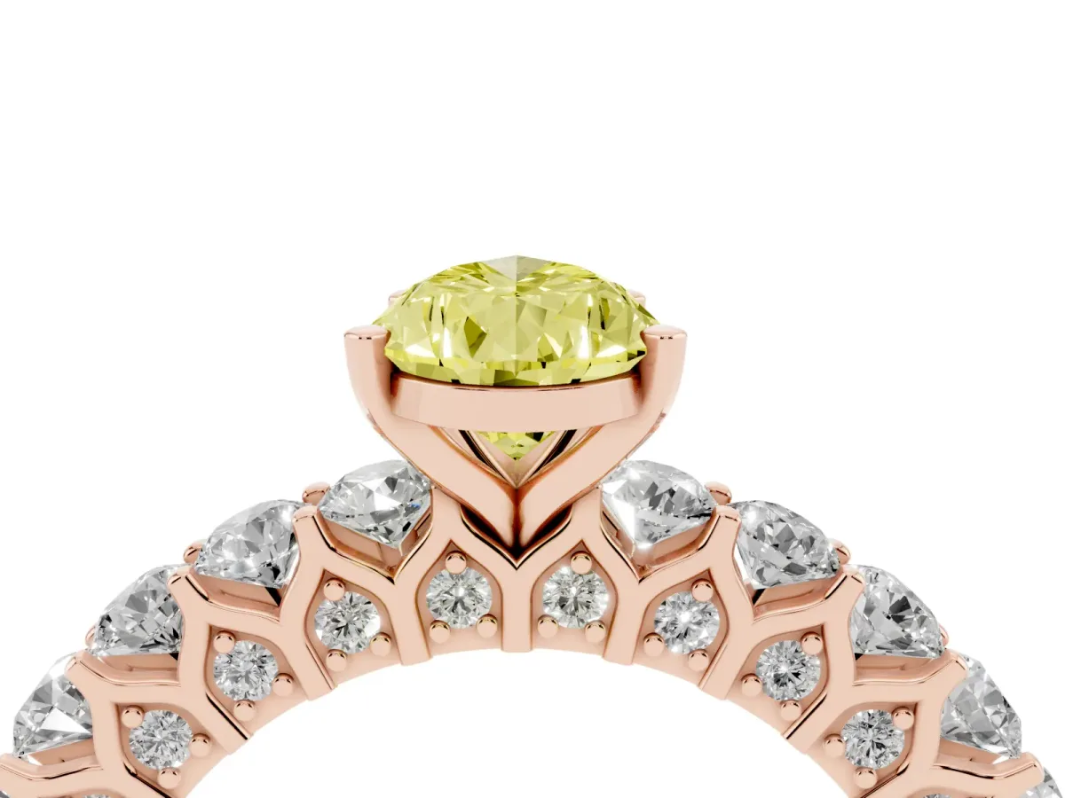 Fancy Yellow Pear Cut Diamond Solitaire Ring with Shared Prong Pavé Band and Four-Prong Setting Rose gold