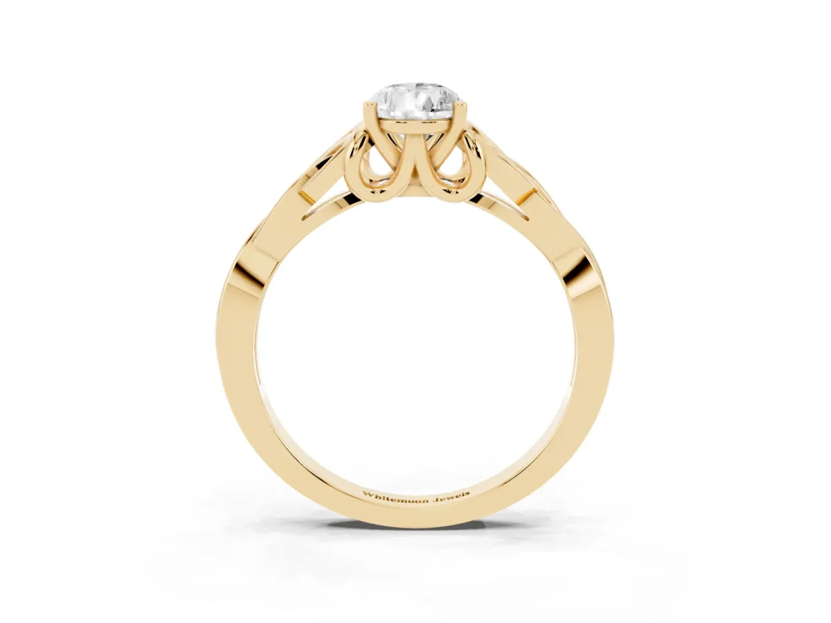 Pear Cut Diamond Solitaire Engagement Ring with Celtic Knot Band and Four-Prong Setting Yellow gold