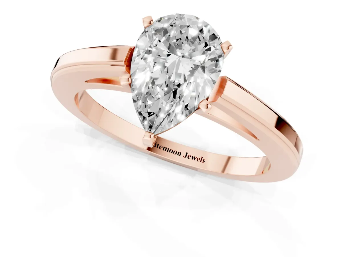 Pear Cut Solitaire Diamond Ring with Four-Prong Setting and Classic Band Rose gold
