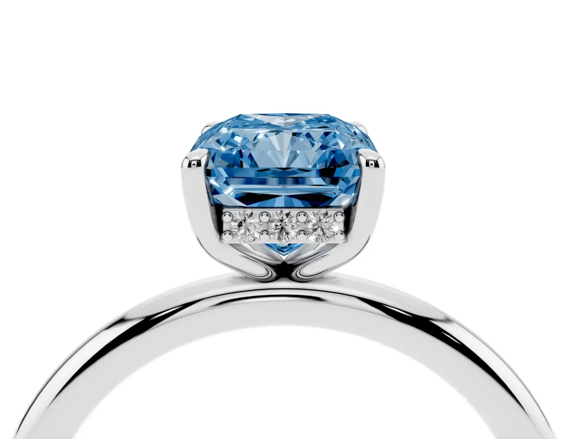Fancy Blue Radiant Cut Diamond Solitaire Ring with Thin Band and Four-Prong Setting Silver