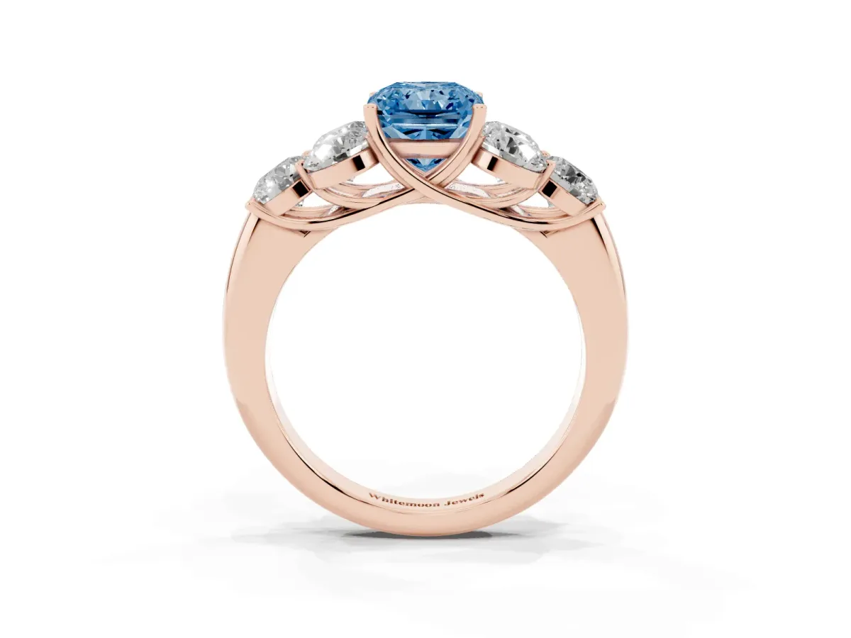 Fancy Blue Radiant Cut Cut Diamond Cluster Ring with Round Accent Stones and Prong Setting on a Classic Band Rose gold