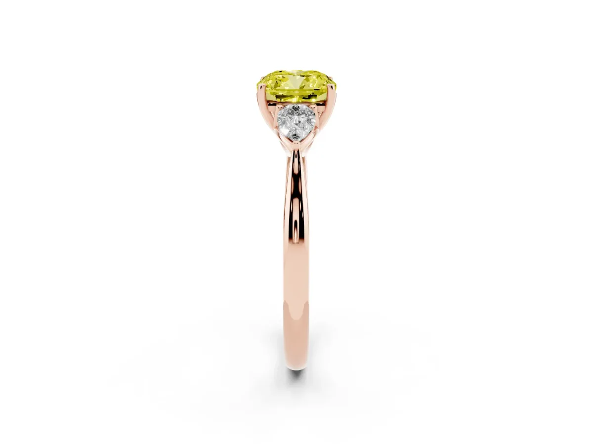 Fancy Yellow Three-Stone Cushion Cut Diamond Ring with Pear Side Stones in Four-Prong Setting Rose gold