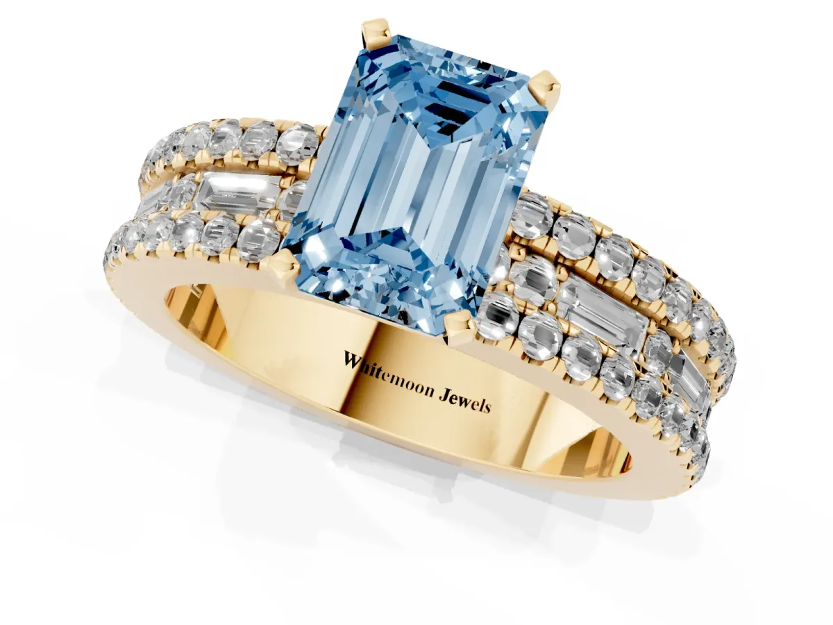 Fancy Blue Emerald Cut Diamond Solitaire Ring with Pavé and Channel Set Band Yellow gold
