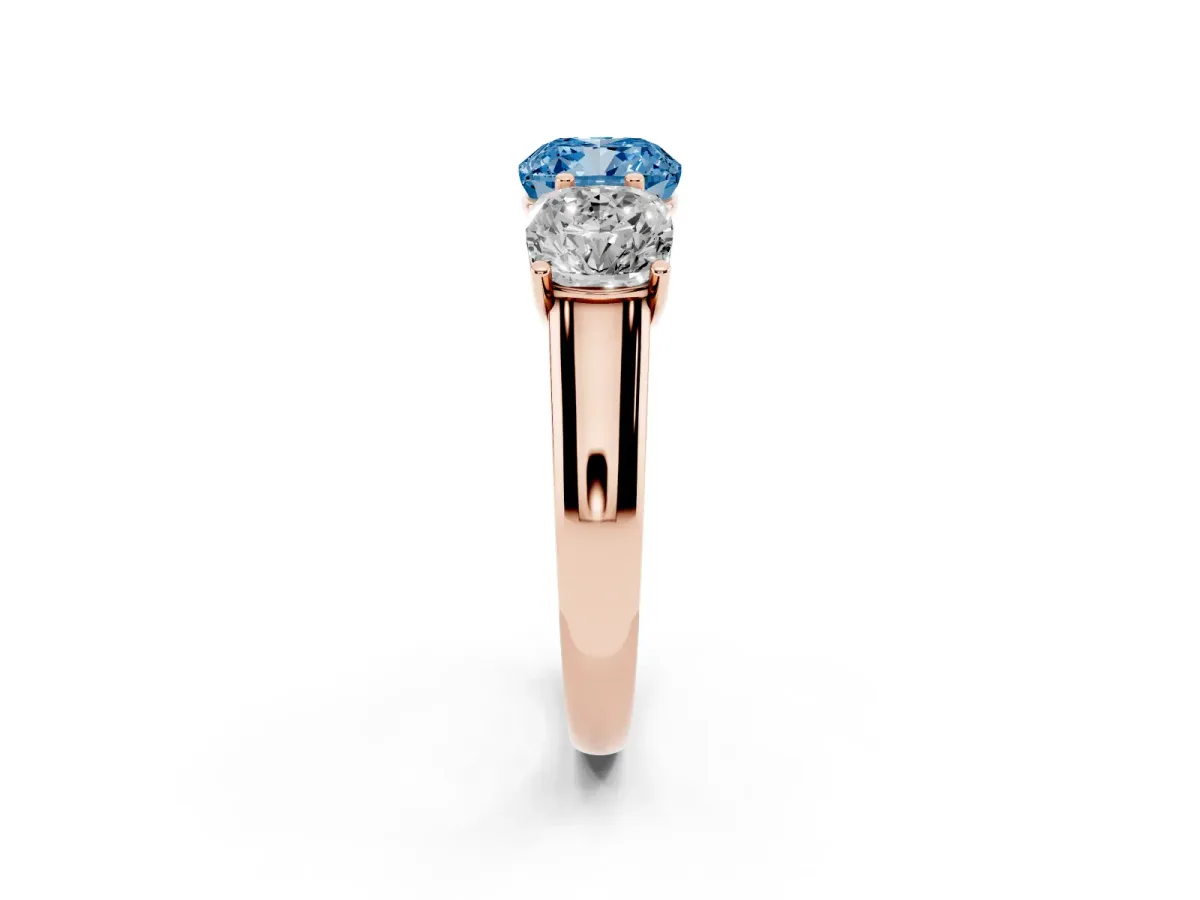 Fancy Blue Cushion Cut Three-Stone Diamond Ring with Prong Setting on a Classic Band Rose gold