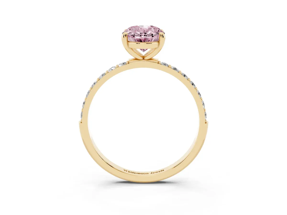 Fancy Pink Oval Cut Diamond Solitaire Ring with Round Pavé Band and Prong Setting Yellow gold