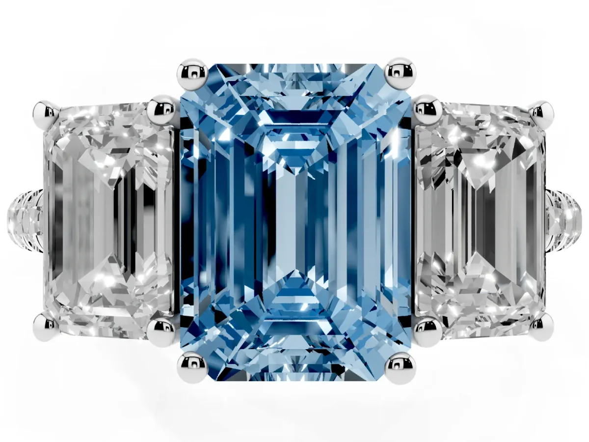 Fancy Blue Three-Stone Emerald Cut Diamond Ring with Round Pavé Band and Prong Setting Silver
