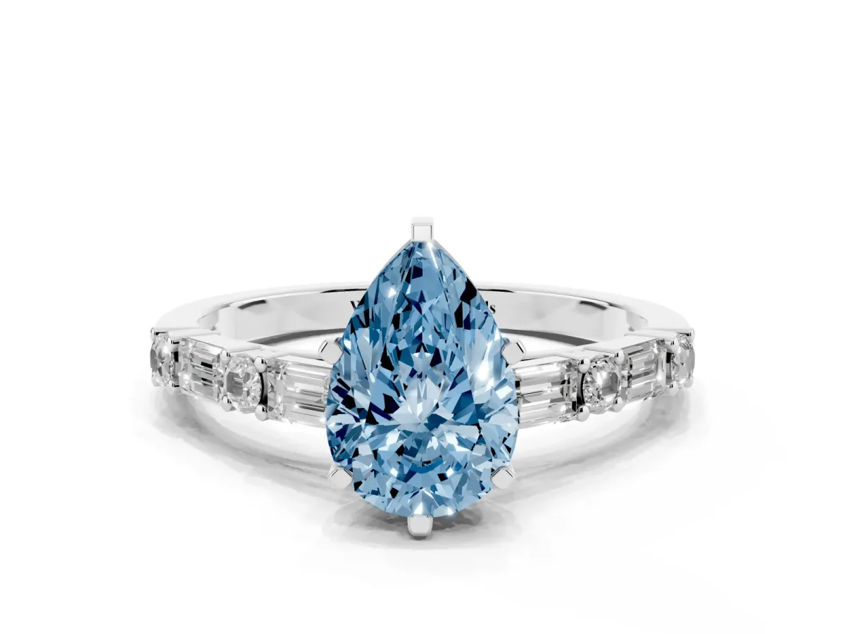 Fancy Blue Pear Cut Diamond Solitaire with Side Baguettes and Channel Set Band Silver