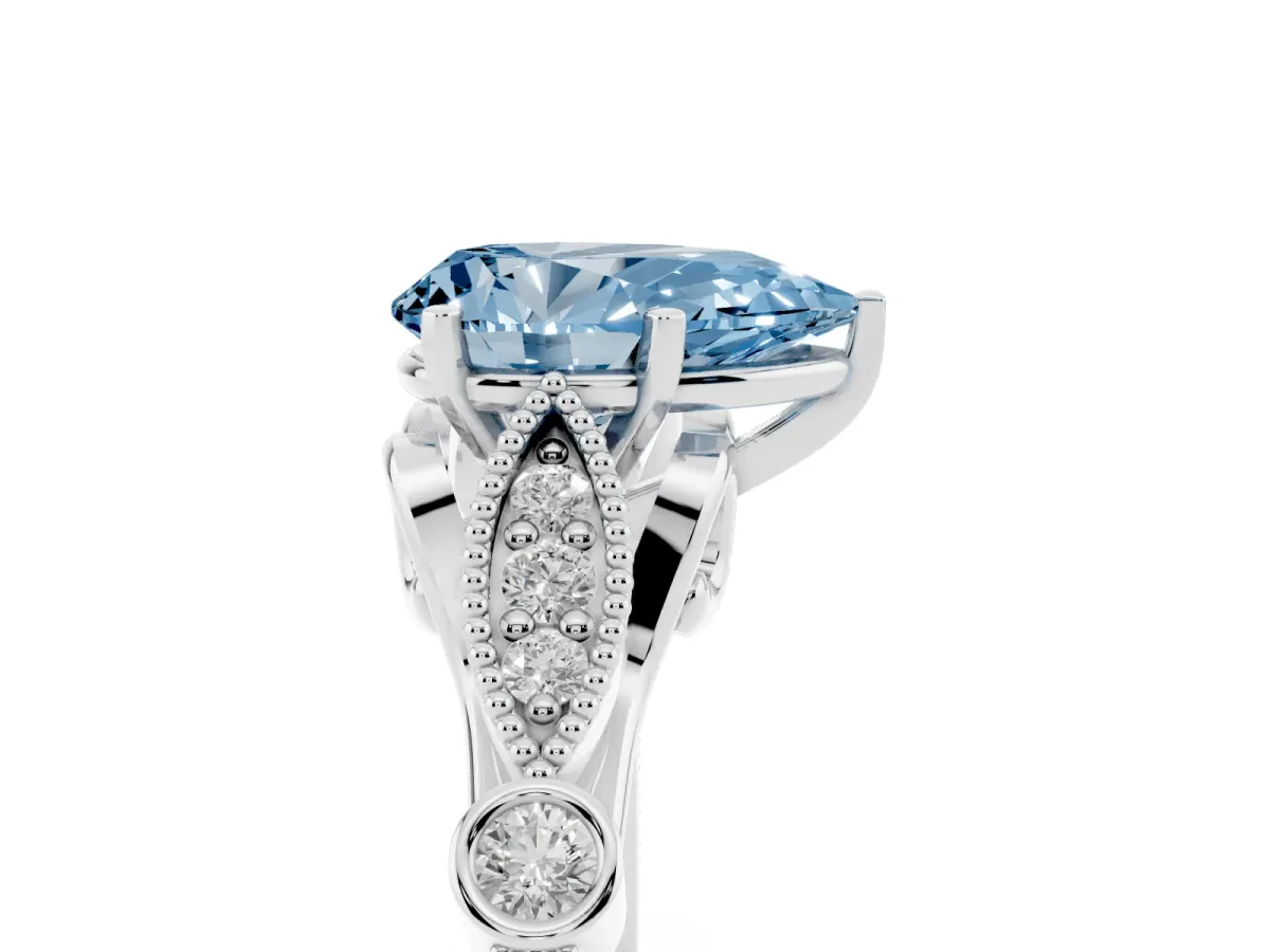 Fancy Blue Pear Cut Cut Diamond with Milgrain Marquise and Bezel Accents on a Solitaire Band with Prong Setting Platinum